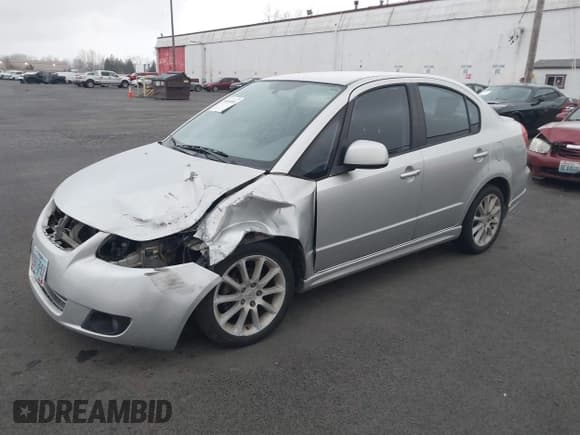 ✅ 2008 Suzuki SX4 Touring 2 • VIN: JS2YC417685100346 • Lot: 41699091. Wystawiony na IAAI z przebiegiem 180 316 mil. Bezpłatny archiwum sprzedaży aukcyjnych z USA i szczegółowy raport historii pojazdu na DreamBid. Zdjęcie 2.