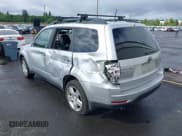 ✅ 2010 Subaru Forester X Limited • VIN: JF2SH6DCXAH714375 • Lot: 42305905. Listed on IAAI with 166,930 mi. Free auction sales archive from the USA and detailed vehicle history report at DreamBid. Image 3.