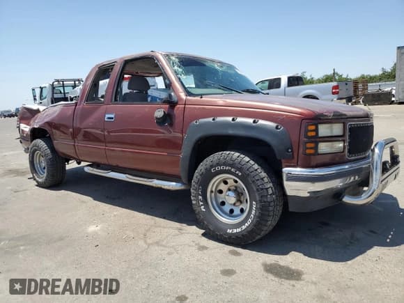 ✅ 1998 GMC Sierra 1500 • VIN: 1GTEK19R1WR511373 • Лот: 60080685. Опубликован ранее на Copart с пробегом 178 199 миль. Бесплатный доступ к архиву аукционных продаж из США и подробный отчёт об истории автомобиля на DreamBid. Изображение 4.