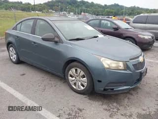 ✅ 2012 Chevrolet Cruze LS • VIN: 1G1PD5SH1C7225695 • Lot: 43280956. Listed on IAAI with 212,557 mi. Free auction sales archive from the USA and detailed vehicle history report at DreamBid. Image 1.