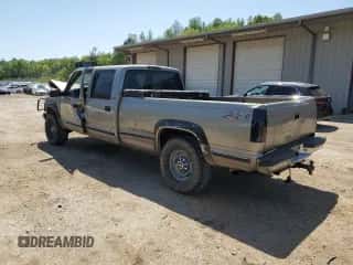 2000 Chevrolet Silverado 3500 с VIN 1GCHK33J6YF516293, выставлен на аукционе Copart как лот 53083035 с пробегом 220 219 миль миль и Списание • Salvage title. История ставок и продаж доступна на DreamBid. Изображение 2.