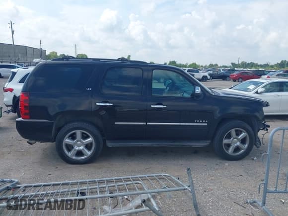 ✅ 2013 Chevrolet Tahoe LTZ • VIN: 1GNSCCE0XDR151771 • Lot: 43088780. Listed on IAAI with 191,788 mi. Free auction sales archive from the USA and detailed vehicle history report at DreamBid. Image 14.