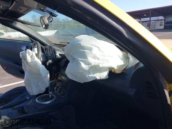 ✅ 2005 Nissan 350Z Touring • VIN: JN1AZ36AX5M753551 • Lot: 41958722. Wystawiony na IAAI z przebiegiem 149 132 mil. Bezpłatny archiwum sprzedaży aukcyjnych z USA i szczegółowy raport historii pojazdu na DreamBid. Zdjęcie 5.