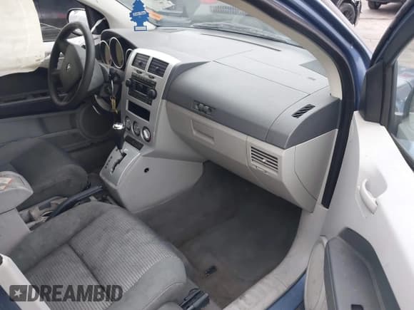 ✅ 2007 Dodge Caliber SXT • VIN: 1B3HB48B47D187063 • Lot: 43754083. Listed on IAAI with 198,763 mi. Free auction sales archive from the USA and detailed vehicle history report at DreamBid. Image 5.