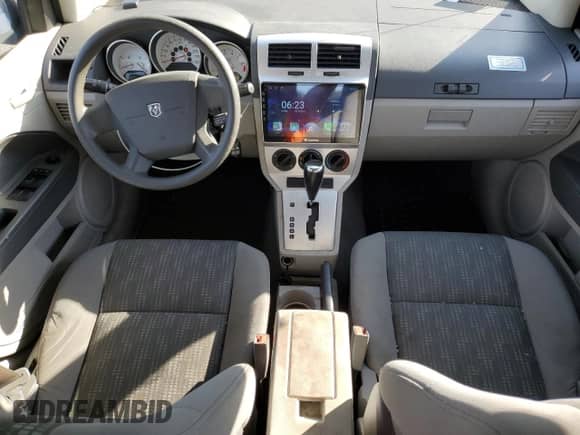 2007 Dodge Caliber SXT с VIN 1B3HB48B87D255381, выставлен на аукционе Copart как лот 70339524 с пробегом 128 338 миль миль и На запчасти • Non repairable. История ставок и продаж доступна на DreamBid. Изображение 8.