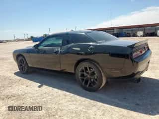 2021 Dodge Challenger SXT с VIN 2C3CDZAG7MH610596, выставлен на аукционе Copart как лот 66000985 с пробегом 63 220 миль миль и Списание • Salvage title. История ставок и продаж доступна на DreamBid. Изображение 2.