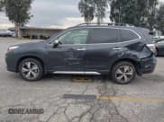 ✅ 2019 Subaru Forester Touring • VIN: JF2SKAWC9KH557196 • Lot: 43752481. Listed on IAAI with 49,883 mi. Free auction sales archive from the USA and detailed vehicle history report at DreamBid. Image 14.