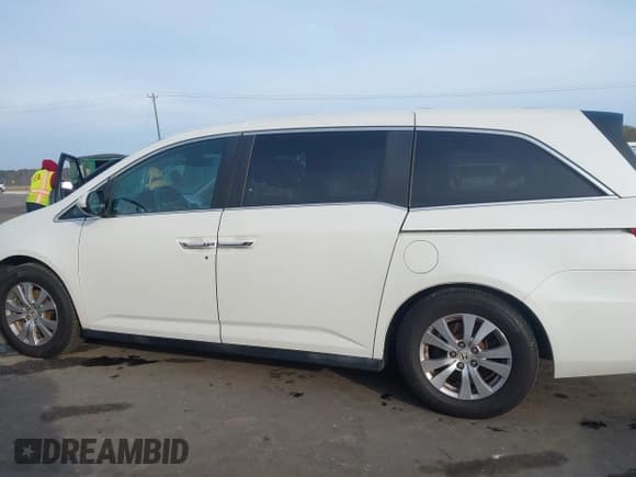 ✅ 2014 Honda Odyssey EX-L • VIN: 5FNRL5H61EB110410 • Лот: 43911278. Опубликован ранее на IAAI с пробегом 170 445 миль. Бесплатный доступ к архиву аукционных продаж из США и подробный отчёт об истории автомобиля на DreamBid. Изображение 14.