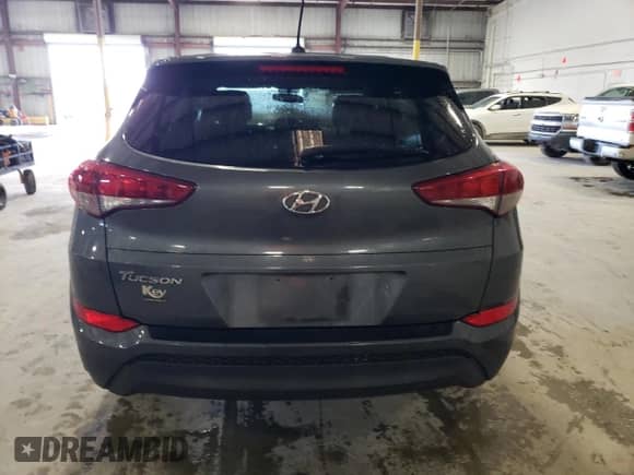 2017 Hyundai Tucson SE z VIN KM8J23A4XHU393961, wystawiony jako Copart lot #85645105 z przebiegiem 86 519 mil mil oraz Szkoda całkowita • Salvage title. Historia ofert i sprzedaży dostępna na DreamBid. Obrazek 6.