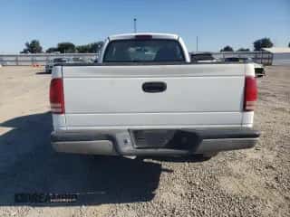 1999 Dodge Dakota z VIN 1B7GG26X2XS308456, wystawiony jako Copart lot #66789914 z przebiegiem 137 399 mil mil oraz Czysty tytuł • Clean title. Historia ofert i sprzedaży dostępna na DreamBid. Obrazek 6.