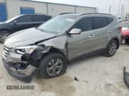 ✅ 2015 Hyundai Santa Fe • VIN: 5XYZU3LB6FG241588 • Лот: 56624244. Опубликован ранее на Copart с пробегом 69 259 миль. Бесплатный доступ к архиву аукционных продаж из США и подробный отчёт об истории автомобиля на DreamBid. Изображение 1.