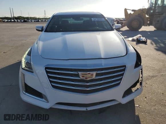 ✅ 2017 Cadillac CTS Luxury RWD • VIN: 1G6AR5SX1H0120860 • Лот: 64180805. Опубликован ранее на Copart с пробегом 123 171 миль. Бесплатный доступ к архиву аукционных продаж из США и подробный отчёт об истории автомобиля на DreamBid. Изображение 5.