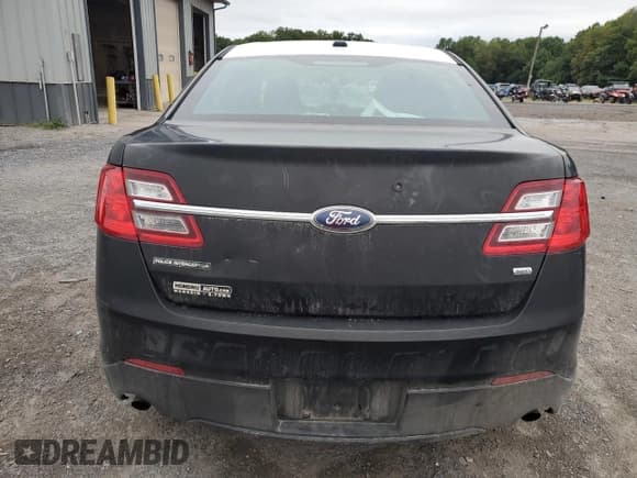 ✅ 2014 Ford Police Interceptor • VIN: 1FAHP2MK0EG148451 • Lot: 69101515. Wystawiony na Copart z przebiegiem 192 918 mil. Bezpłatny archiwum sprzedaży aukcyjnych z USA i szczegółowy raport historii pojazdu na DreamBid. Zdjęcie 6.