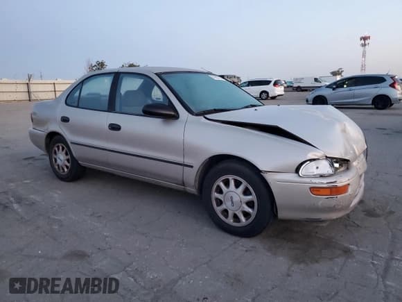 ✅ 1994 Geo Prizm • VIN: 1Y1SK5382RZ047889 • Lot: 51683725. Listed on Copart with 149,793 mi. Free auction sales archive from the USA and detailed vehicle history report at DreamBid. Image 4.