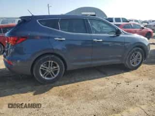 2018 Hyundai Santa Fe 2.4L z VIN 5NMZTDLB9JH095100, wystawiony jako Copart lot #64850795 z przebiegiem 92 794 mil mil oraz Szkoda całkowita • Salvage title. Historia ofert i sprzedaży dostępna na DreamBid. Obrazek 3.