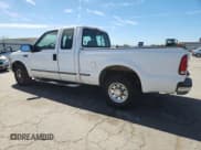 ✅ 1999 Ford F-250 XL • VIN: 1FTNX20L3XEA86599 • Lot: 67852405. Listed on Copart with 251,284 mi. Free auction sales archive from the USA and detailed vehicle history report at DreamBid. Image 2.