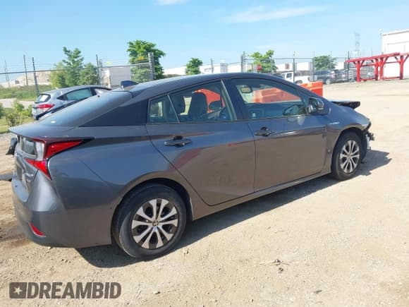 ✅ 2022 Toyota Prius LE • VIN: JTDL9MFU4N3034548 • Lot: 42574875. Listed on IAAI with 92,487 mi. Free auction sales archive from the USA and detailed vehicle history report at DreamBid. Image 4.