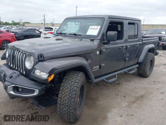 ✅ 2020 Jeep Gladiator Overland • VIN: 1C6HJTFG8LL166086 • Lot: 42016222. Listed on IAAI with 102,232 mi. Free auction sales archive from the USA and detailed vehicle history report at DreamBid. Image 2.
