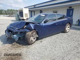 2019 Dodge Charger Police with VIN 2C3CDXAT5KH579234, listed as a Copart auction lot 63946325 with 71,892 mi miles and Salvage title. Bid and sale history available at DreamBid. Image 1.