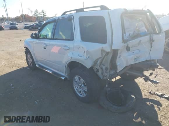2010 Mercury Mariner z VIN 4M2CN8B70AKJ11932, wystawiony jako IAAI lot #40980162 z przebiegiem Nie podano mil oraz . Historia ofert i sprzedaży dostępna na DreamBid. Obrazek 3.