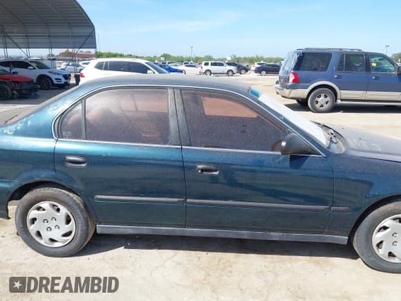 ✅ 1996 Honda Civic LX O • VIN: 2HGEJ667XTH545957 • Лот: 42866308. Опубликован ранее на IAAI с пробегом 217 969 миль. Бесплатный доступ к архиву аукционных продаж из США и подробный отчёт об истории автомобиля на DreamBid. Изображение 13.