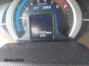 ✅ 2010 Honda Insight EX • VIN: JHMZE2H72AS027985 • Лот: 43626365. Опубликован ранее на IAAI с пробегом 307 003 миль. Бесплатный доступ к архиву аукционных продаж из США и подробный отчёт об истории автомобиля на DreamBid. Изображение 7.