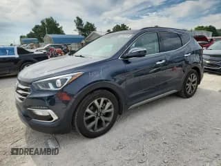 ✅ 2018 Hyundai Santa Fe Ultimate • VIN: 5NMZWDLA7JH089648 • Лот: 62087235. Опубликован ранее на Copart с пробегом 69 177 миль. Бесплатный доступ к архиву аукционных продаж из США и подробный отчёт об истории автомобиля на DreamBid. Изображение 1.
