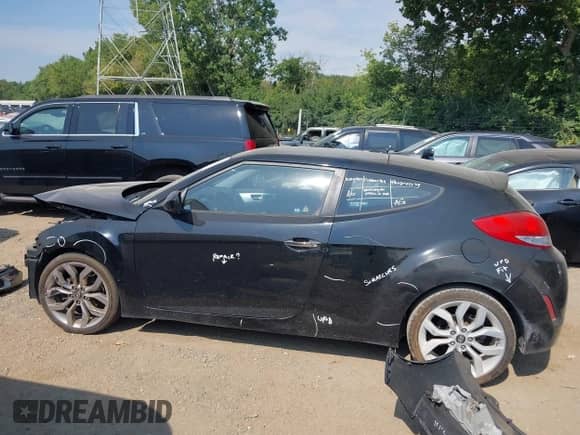 2014 Hyundai Veloster with VIN KMHTC6AD2EU214301, listed as a IAAI auction lot 43016517 with 122,845 mi miles and . Bid and sale history available at DreamBid. Image 14.