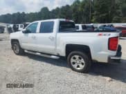✅ 2018 Chevrolet Silverado 1500 LT • VIN: 3GCUKREC9JG552340 • Lot: 81281355. Listed on Copart with 64,452 mi. Free auction sales archive from the USA and detailed vehicle history report at DreamBid. Image 2.