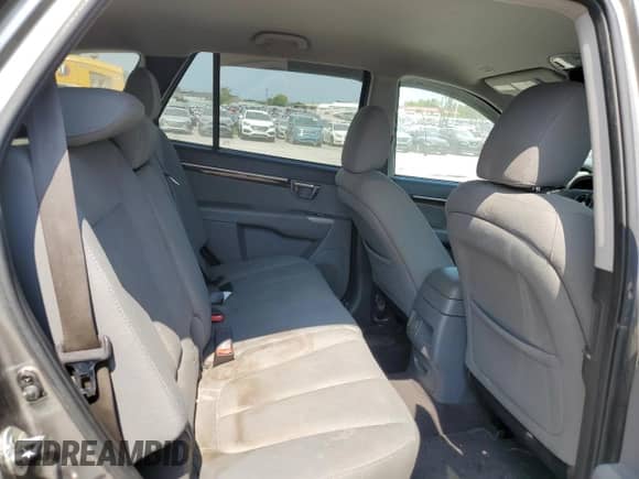 2012 Hyundai Santa Fe GLS z VIN 5XYZGDAB9CG114426, wystawiony jako Copart lot #69819974 z przebiegiem 233 854 mil mil oraz Czysty tytuł • Clean title. Historia ofert i sprzedaży dostępna na DreamBid. Obrazek 11.