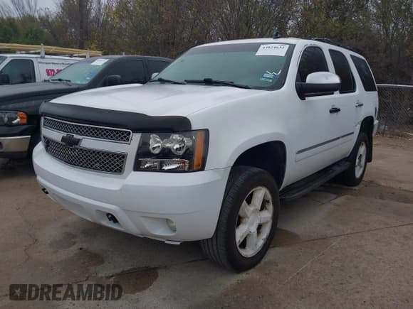 ✅ 2009 Chevrolet Tahoe LTZ • VIN: 1GNFK33029R248011 • Lot: 43824632. Listed on IAAI with 221,064 mi. Free auction sales archive from the USA and detailed vehicle history report at DreamBid. Image 2.