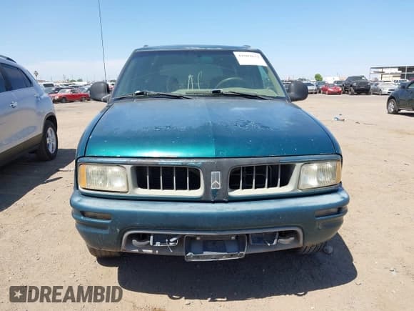 ✅ 1996 Oldsmobile Bravada • VIN: 1GHDT13W5T2711291 • Lot: 42502672. Listed on IAAI with 219,062 mi. Free auction sales archive from the USA and detailed vehicle history report at DreamBid. Image 6.