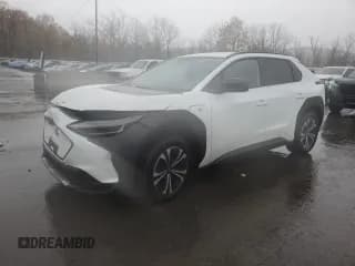 ✅ 2024 Subaru Solterra Premium • VIN: JTMABABA5RA088397 • Лот: 90338325. Опубликован ранее на Copart с пробегом 9 935 миль. Бесплатный доступ к архиву аукционных продаж из США и подробный отчёт об истории автомобиля на DreamBid. Изображение 1.