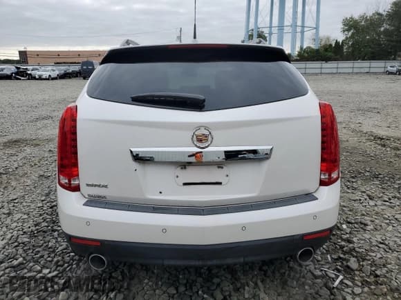 ✅ 2011 Cadillac SRX Premium Collection • VIN: 3GYFNCEY9BS508100 • Lot: 80612895. Wystawiony na Copart z przebiegiem 87 375 mil. Bezpłatny archiwum sprzedaży aukcyjnych z USA i szczegółowy raport historii pojazdu na DreamBid. Zdjęcie 6.