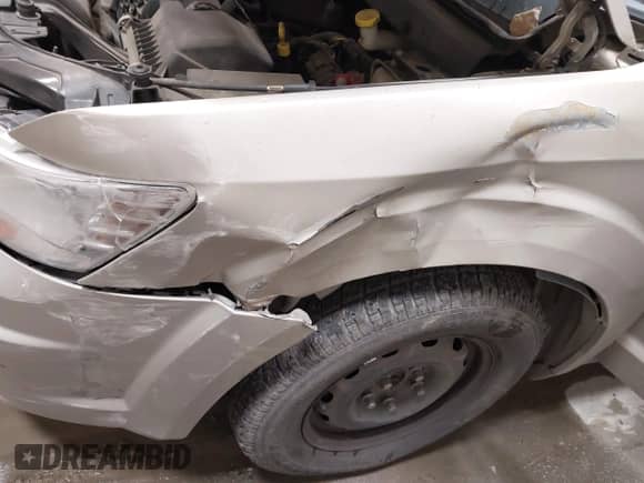 2009 Dodge Journey SE z VIN 3D4GG47B99T561583, wystawiony jako IAAI lot #43402002 z przebiegiem 137 189 mil mil oraz . Historia ofert i sprzedaży dostępna na DreamBid. Obrazek 6.