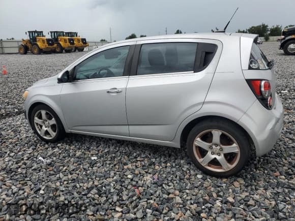 ✅ 2012 Chevrolet Sonic LTZ • VIN: 1G1JE6SH7C4123988 • Lot: 64845065. Listed on Copart with 130,139 mi. Free auction sales archive from the USA and detailed vehicle history report at DreamBid. Image 2.