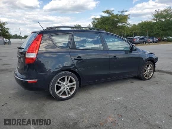 2010 Hyundai Elantra GLS with VIN KMHDC8AE4AU061956, listed as a Copart auction lot 70474545 with 168,215 mi miles and Salvage title. Bid and sale history available at DreamBid. Image 3.