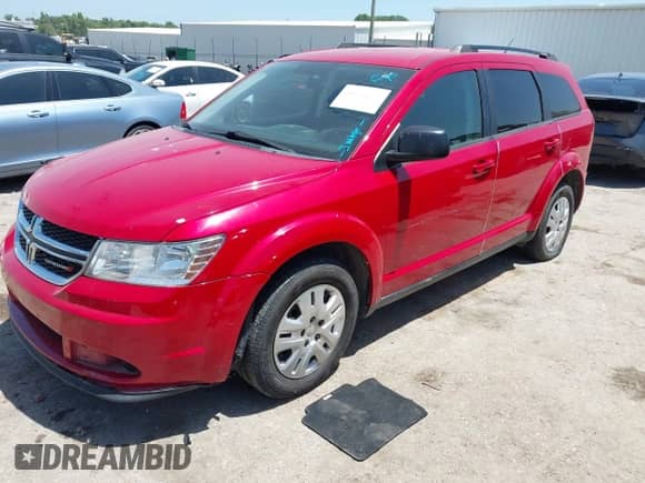 2018 Dodge Journey SE с VIN 3C4PDCAB9JT295981, выставлен на аукционе IAAI как лот 42804570 с пробегом 120 602 миль миль и . История ставок и продаж доступна на DreamBid. Изображение 17.