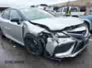 2021 Toyota Camry Hybrid XSE z VIN 4T1K31AK9MU020943, wystawiony jako IAAI lot #41969968 z przebiegiem 33 773 mil mil oraz . Historia ofert i sprzedaży dostępna na DreamBid. Obrazek 6.