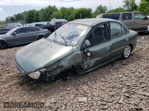 ✅ 2002 Kia Rio • VIN: KNADC123726158130 • Lot: 59104584. Listed on Copart with 60,553 mi. Free auction sales archive from the USA and detailed vehicle history report at DreamBid. Image 1.
