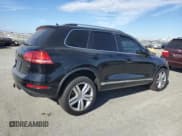 ✅ 2012 Volkswagen Touareg Lux • VIN: WVGEF9BP7CD009502 • Lot: 71730705. Listed on Copart with 132,347 mi. Free auction sales archive from the USA and detailed vehicle history report at DreamBid. Image 3.