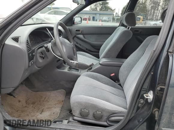 ✅ 1994 Toyota Camry LE • VIN: 4T1GK12WXRU044900 • Lot: 47033555. Wystawiony na Copart z przebiegiem 136 519 mil. Bezpłatny archiwum sprzedaży aukcyjnych z USA i szczegółowy raport historii pojazdu na DreamBid. Zdjęcie 7.