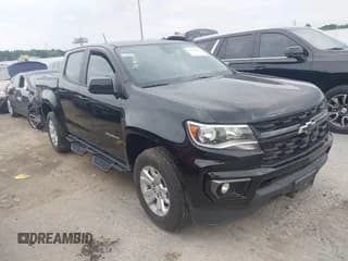 ✅ 2021 Chevrolet Colorado 2WD LT • VIN: 1GCGSCEA6M1273293 • Lot: 42785391. Listed on IAAI with 54,887 mi. Free auction sales archive from the USA and detailed vehicle history report at DreamBid. Image 1.