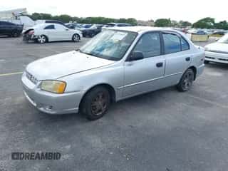 2002 Hyundai Accent GL z VIN KMHCG45C52U378454, wystawiony jako IAAI lot #41418653 z przebiegiem 173 564 mil mil oraz . Historia ofert i sprzedaży dostępna na DreamBid. Obrazek 2.