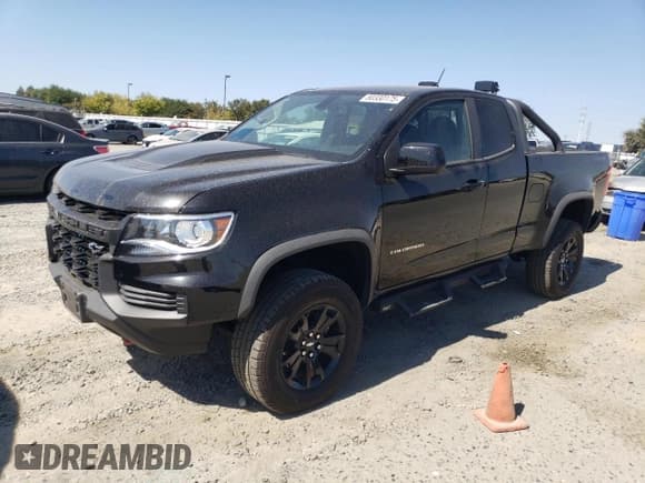 ✅ 2021 Chevrolet Colorado 4WD ZR2 • VIN: 1GCRTEEN5M1128122 • Лот: 80330175. Опубликован ранее на Copart с пробегом 76 144 миль. Бесплатный доступ к архиву аукционных продаж из США и подробный отчёт об истории автомобиля на DreamBid. Изображение 1.
