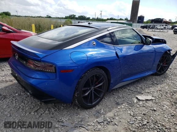 ✅ 2023 Nissan Z Performance • VIN: JN1BZ4BH4PM311459 • Lot: 52156984. Listed on Copart with 12,312 mi. Free auction sales archive from the USA and detailed vehicle history report at DreamBid. Image 3.