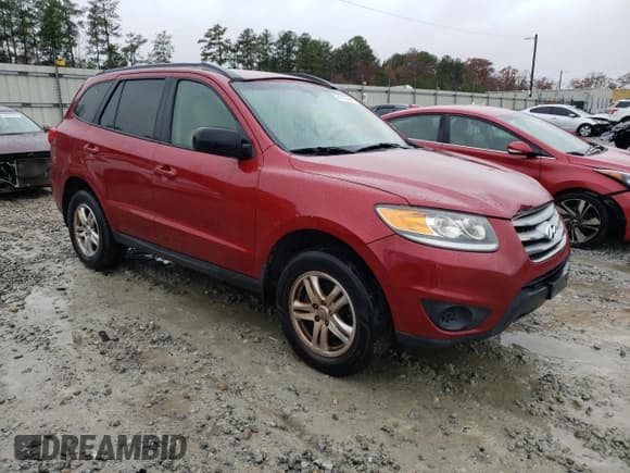 ✅ 2012 Hyundai Santa Fe GLS • VIN: 5XYZGDAB5CG126802 • Lot: 84213044. Listed on Copart with 185,397 mi. Free auction sales archive from the USA and detailed vehicle history report at DreamBid. Image 4.