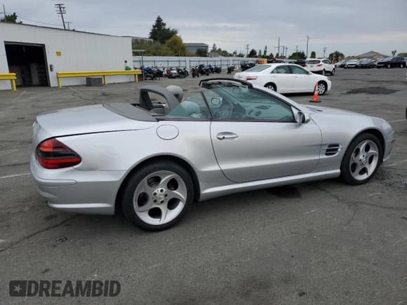 ✅ 2005 Mercedes-Benz SL 500 • VIN: WDBSK75F05F091086 • Lot: 84013865. Listed on Copart with 119,950 mi. Free auction sales archive from the USA and detailed vehicle history report at DreamBid. Image 3.