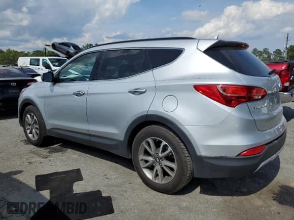 ✅ 2016 Hyundai Santa Fe • VIN: 5XYZU3LA8GG348697 • Лот: 69217195. Опубликован ранее на Copart с пробегом 169 988 миль. Бесплатный доступ к архиву аукционных продаж из США и подробный отчёт об истории автомобиля на DreamBid. Изображение 2.