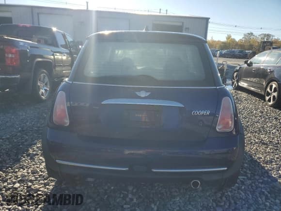 ✅ 2005 MINI Hardtop • VIN: WMWRC33405TC56434 • Lot: 87384035. Listed on Copart with 99,950 mi. Free auction sales archive from the USA and detailed vehicle history report at DreamBid. Image 6.